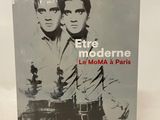 the cover of a book with two men standing next to each other