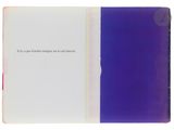 an open book with a picture of a purple and blue cover