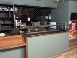 an image of a kitchen with a counter and a counter top