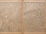 an old book with a map of a city on it