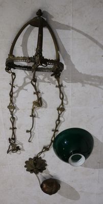 a picture of a wall with a clock and other items on it
