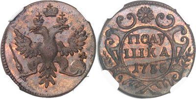 an old coin with a bird on it and a crown on top
