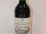 a bottle of wine that is sitting on a table
