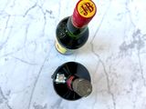 a bottle of wine that is sitting on a table