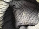 a blanket that has a picture of an elephant inside of it