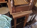 a pile of furniture sitting on the floor in a room