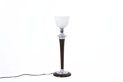 a lamp that is sitting on a table with a cord