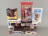 a lot of action figures in the boxes on the table