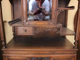 a man taking a picture of himself in a mirror