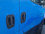 a close up of a blue van with two windows