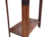 a wooden table with a shelf on the top of it