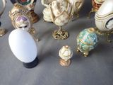 many different types of eggs on display on a table
