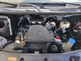 a picture of a car engine with its hood open