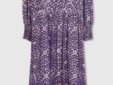 the dress is purple and white with a chevron pattern on it