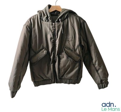 jacket on a hanger on a hanger with a white background