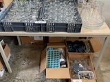 a table with a lot of glasses and bottles on it