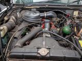 a car engine with a lot of wires in it