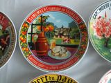 four plates with different designs on them on a table