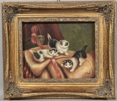 an image of a painting of kittens on a table with a cloth
