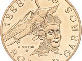 une image d'une pièce de monnaie en gros plan sur fond blanc