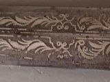 a knife that is laying on a table