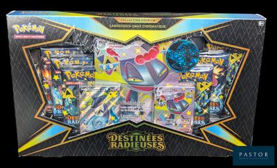 a close up of a box of pokemon cards on a black background