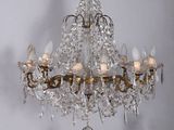 a chandelier hanging from the ceiling in a room