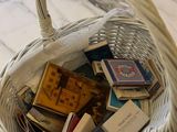 a basket full of books sitting on a marble table
