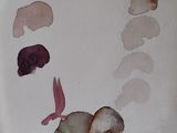 une photo d'un dessin représentant un visage réalisé à l'aquarelle