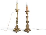 two candles that are sitting on a table