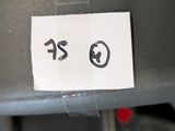 a sticker on the back of a seat of a car