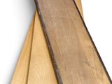 three pieces of plywood are stacked on top of each other