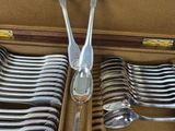 silverware in a case with spoons and spoons in it