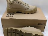 a close up of a pair of shoes on top of a box