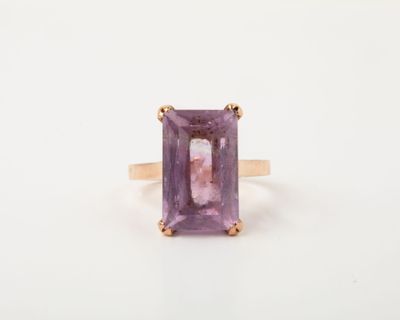 an image of a ring with an amethorate stone in it
