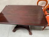 a small table with chairs and a chair on it