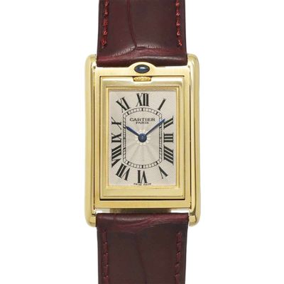a close up of a wrist watch with roman numerals on it