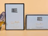 an image of an angel perfume bottle next to a box of perfume