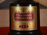 a bottle of wine that is sitting on a table