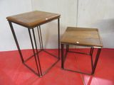 two tables that are sitting on a red floor