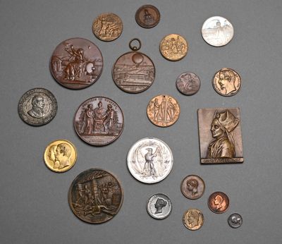 a lot of coins that are sitting on a table