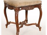 an image of a wooden bench with a cushion on top of it