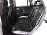 a black leather seat in the back of a car