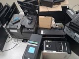a pile of electronic equipment that is sitting on the floor