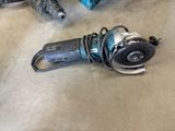 two tools that are laying on the floor