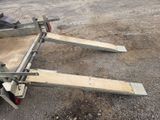 a trailer that has a flat bed attached to it