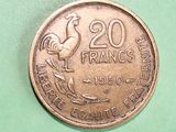 a coin with a picture of a rooster on it