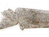 a piece of metal that has been left on the ground