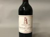 a bottle of wine that is sitting on a table