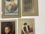 four framed pictures of women and a dog on a white surface